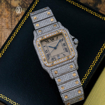 Angled view of Cartier Diamond Watch with diamond-encrusted bezel and bracelet
