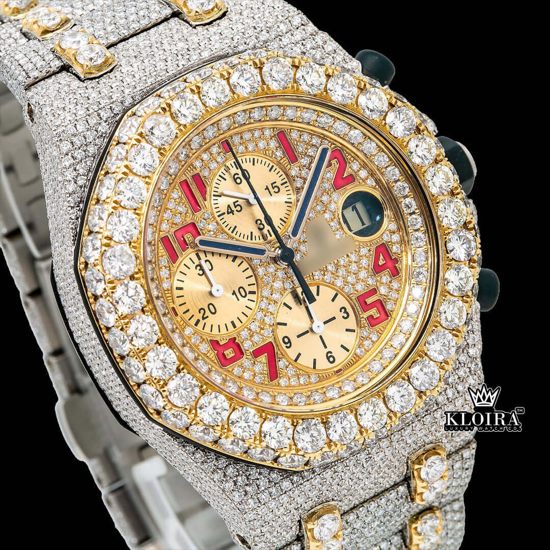 AP Chronograph Iced Out VVS Moissanite Gold Watch with diamond-encrusted case and red accents.