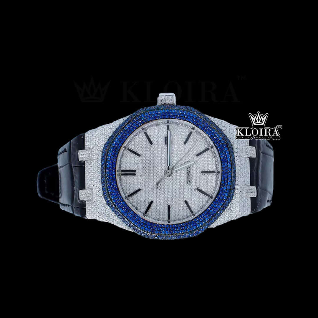 AP Royal Oak Blue Sapphire iced out watch with silver dial and black leather strap, embellished with moissanite diamonds.