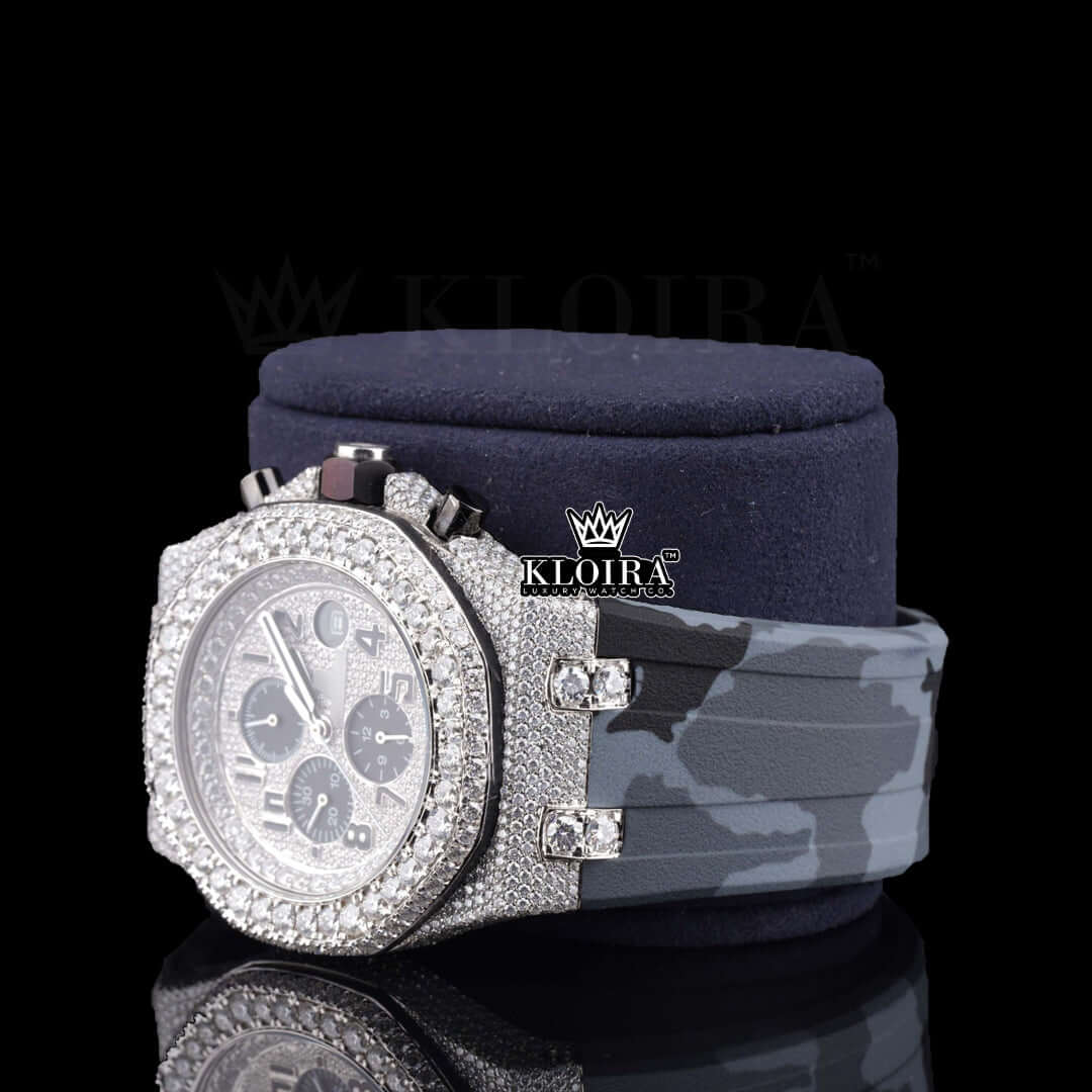 Iced out white dial moissanite diamond watch with grey camo strap and black chronograph features.