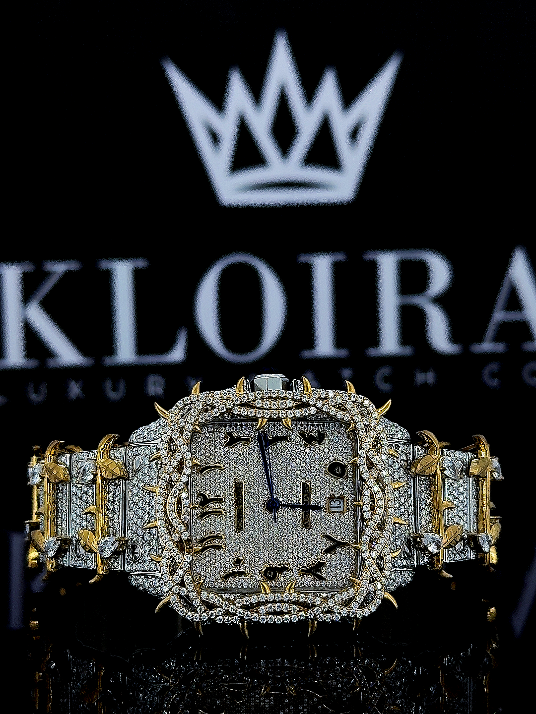 Cartier Santos Jesus Thorn yellow gold moissanite watch with diamond-encrusted face and bold design.
