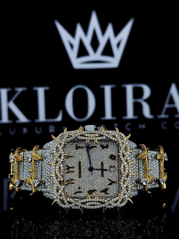 Cartier Santos Jesus Thorn yellow gold moissanite watch with diamond-encrusted face and bold design.