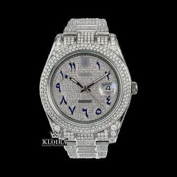 Iced Out Datejust Rolex watch with blue Arabic dial, moissanite diamonds, and 14K gold featuring a luxury design.