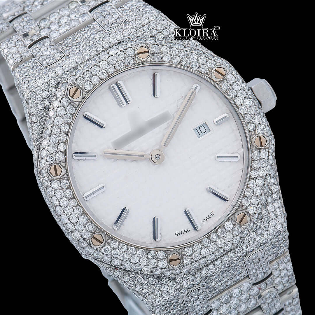 White dial iced out Moissanite diamond watch with 42mm case and sparkling silver bracelet.