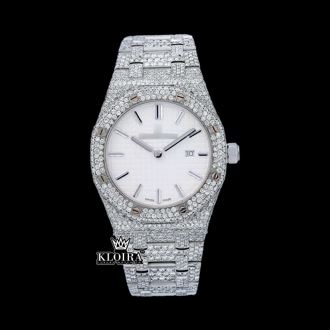 White dial iced out Moissanite diamond watch with 42mm case and sparkling silver bracelet.