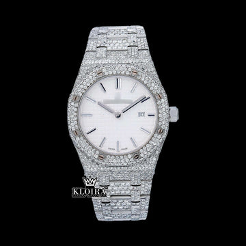White dial iced out Moissanite diamond watch with 42mm case and sparkling silver bracelet.