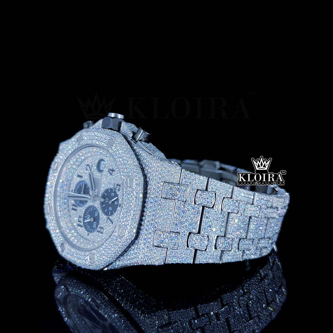 Luxury AP iced out moissanite chronograph watch with black subdials and 14K gold plating.