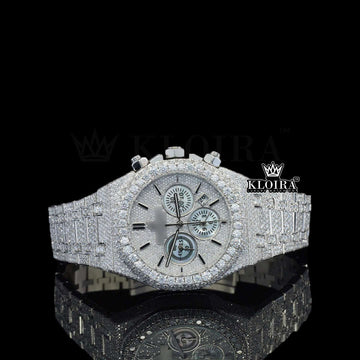 Fully iced out AP diamond chronograph watch with silver dial, VVS clarity diamonds, and gold-plated case.