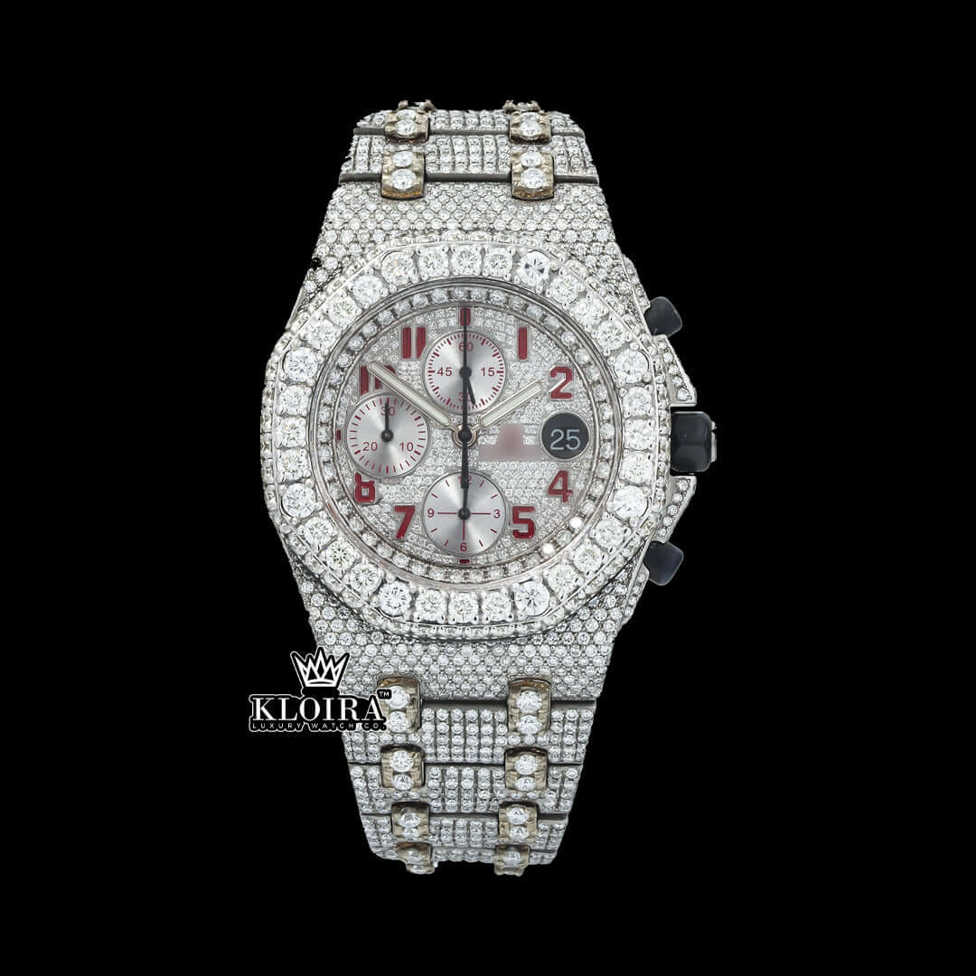 Iced out watch with red numerals and moissanite diamonds, featuring a 42mm case and 14K gold detailing.