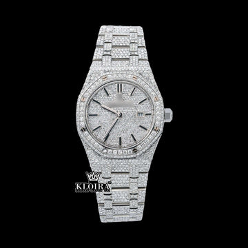 Audemars Piguet iced out watch with Moissanite diamonds and silver accents on a white background.