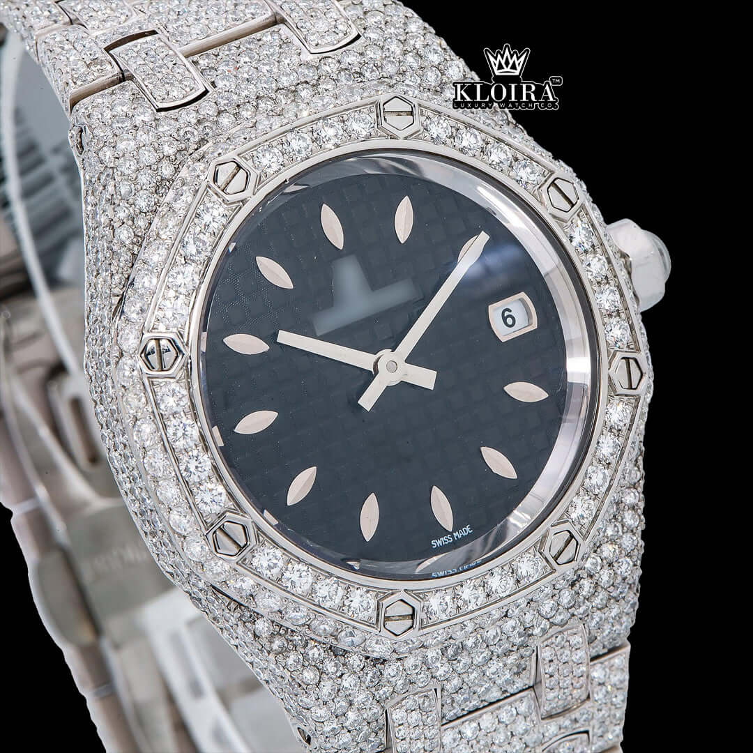 AP Royal Oak fully iced out moissanite diamond watch with black dial and stainless steel bracelet.