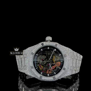 Front view of Moissanite AP skeleton watch with fully iced case and strap, showcasing open-worked dial and visible movement components