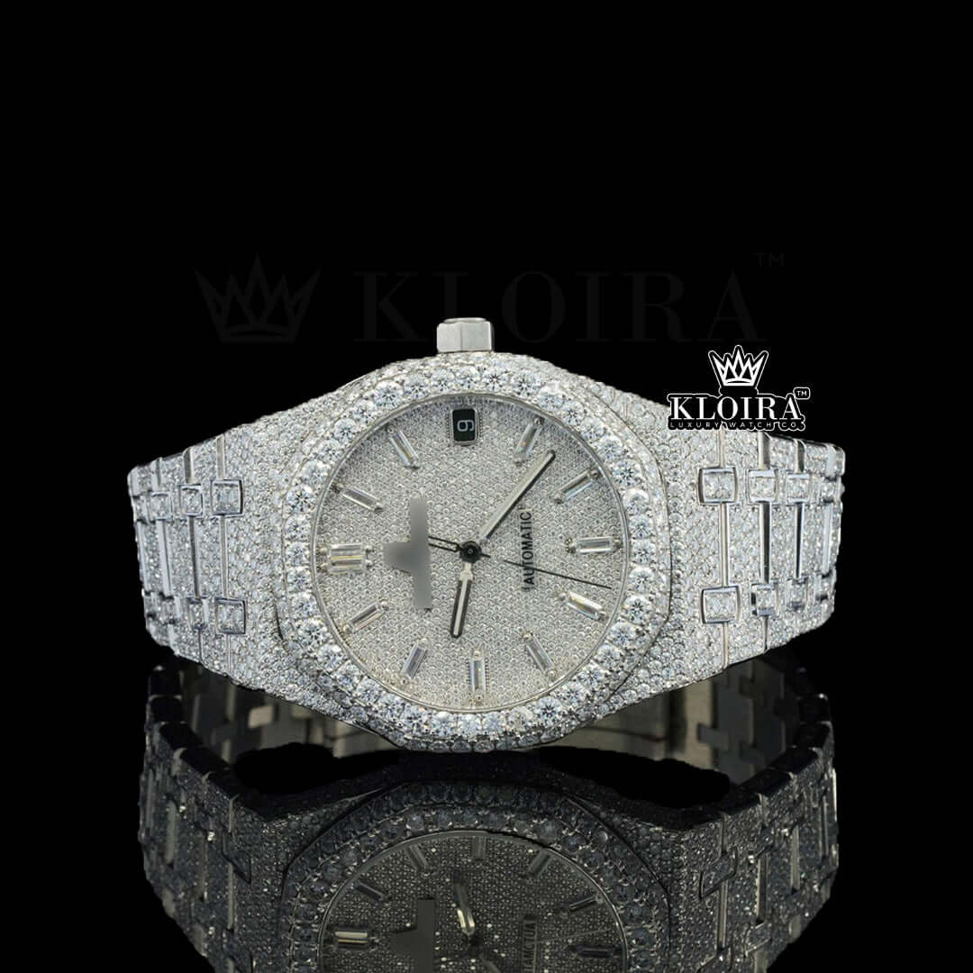 Fully iced out silver watch with sparkling stones and a textured dial, showcasing elegance and luxury.