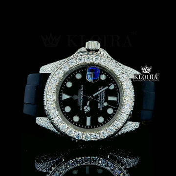 Rolex Yacht-Master iced out watch with diamond bezel, black dial, and rubber strap accentuating luxury.