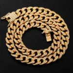 Moissanite Cuban Link Chain Goldrush in 14K Yellow Gold showcasing round cut stones and elegant design.