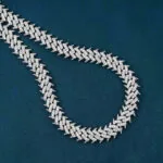 10mm Round Moissanite Cuban Link Chain Luminor in 14K Yellow Gold Closeup