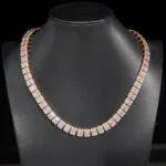 11mm Round Moissanite Tennis Chain BaguetteGlow in 14K Rose Gold Closeup Neck View
