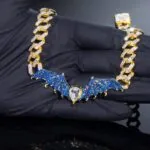 12mm Round Moissanite Cuban Link Chain Batlink in 14K Yellow Gold Closeup