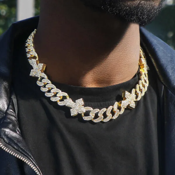 20mm Round Moissanite Cuban Link Chain Crosschain in 14K Yellow Gold Closeup Neck