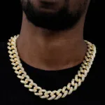 20mm Round Moissanite Cuban Link Chain Glimmerlink in 14K Yellow Gold Neck