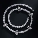 5mm Round Moissanite Tennis Chain Gripstone in 14K White Gold