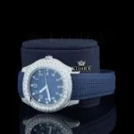 Blue Dial Standard Numerals Semi Iced Out Blue Rubber Strap Moissanite Watch Left Profile View