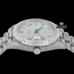 Blue Roman Numerals Dial Baguette Strap Iced Out Moissanite Watch Crown View