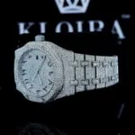 Fully Iced Out Red Arabic Numerals White Dial Moissanite Watch Left Profile View