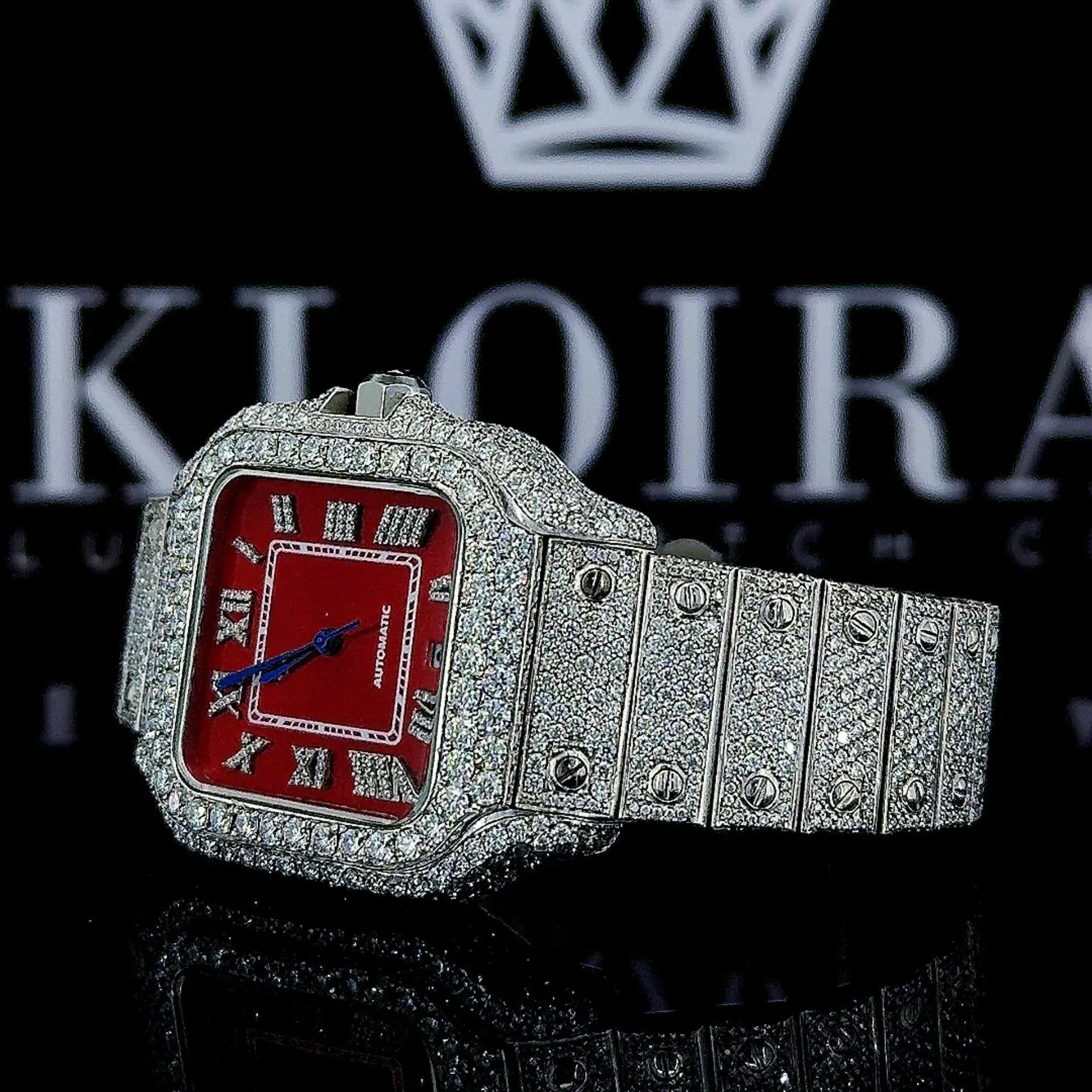 Fully Iced Out Red Dial Roman Numerals Moissanite Diamond Watch Left Profile View
