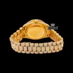Gold Tone Blue Roman Dial Day Date Display Iced Out Moissanite Watch Caseback View