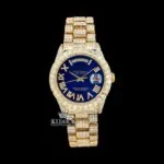 Gold Tone Blue Roman Dial Day Date Display Iced Out Moissanite Watch Front View