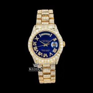 Gold Tone Blue Roman Dial Day Date Display Iced Out Moissanite Watch
