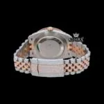 Iced Out Two Tone Rose Gold Dial Roman Numeral Moissanite Watch Caseback View