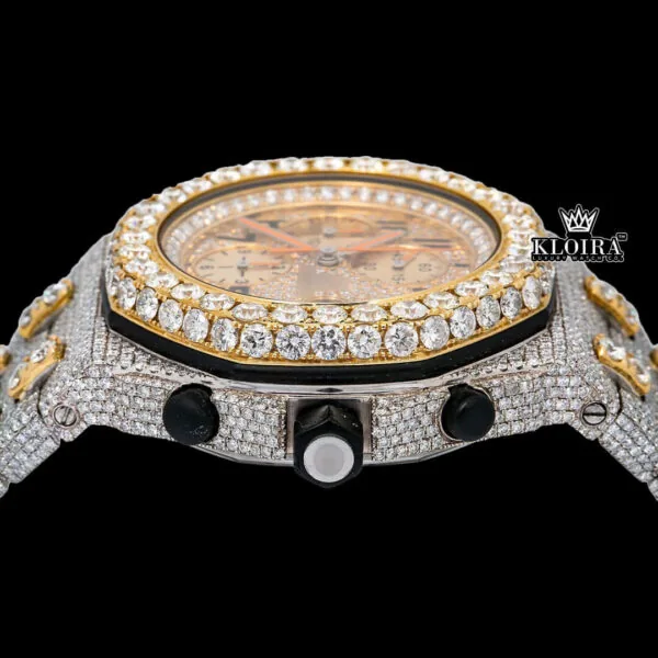 Close-up of a Two Tone AP moissanite diamond watch with 14K gold accents and a sparkling diamond bezel.