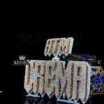 Supreme Shine Crema Emblem Closeup Left